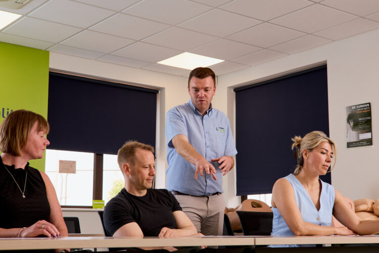 Image of one of our trainers on the Mastering Record Keeping training course engaging with attendees