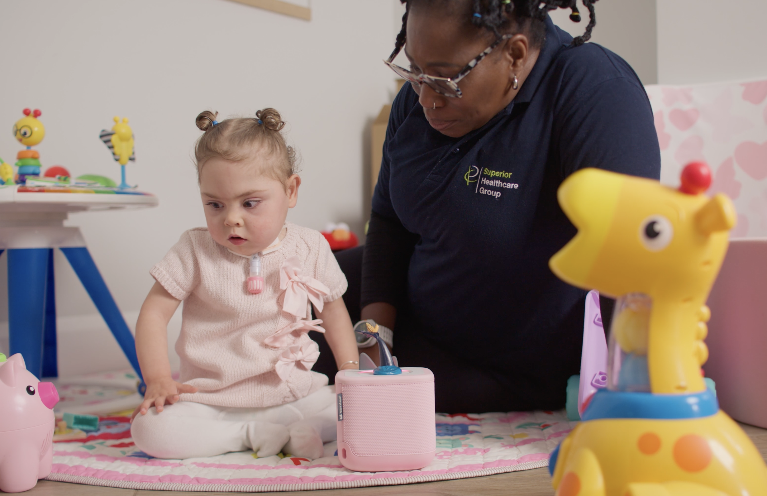 Toddler with her carer