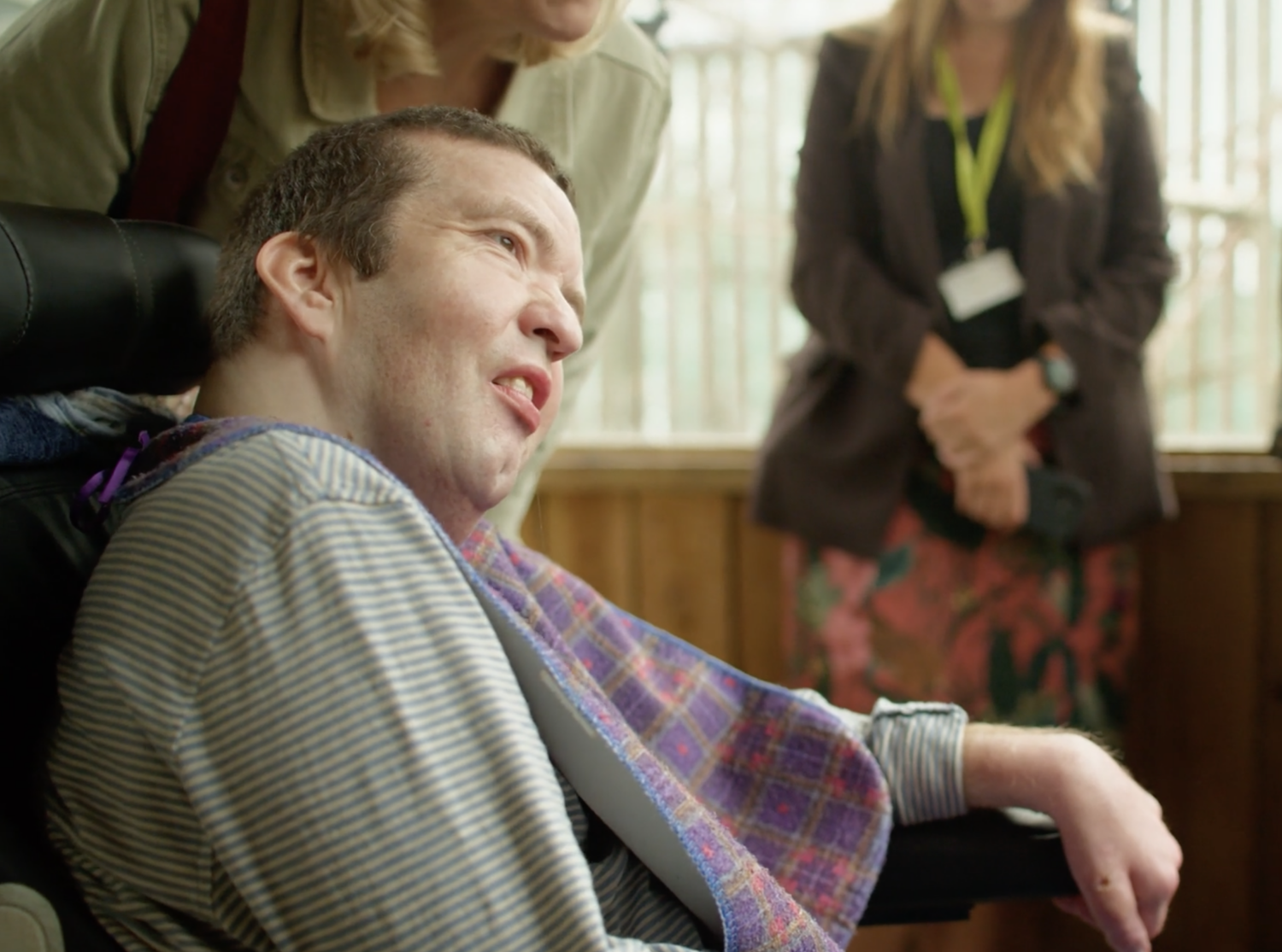 Man with complex care needs smiling